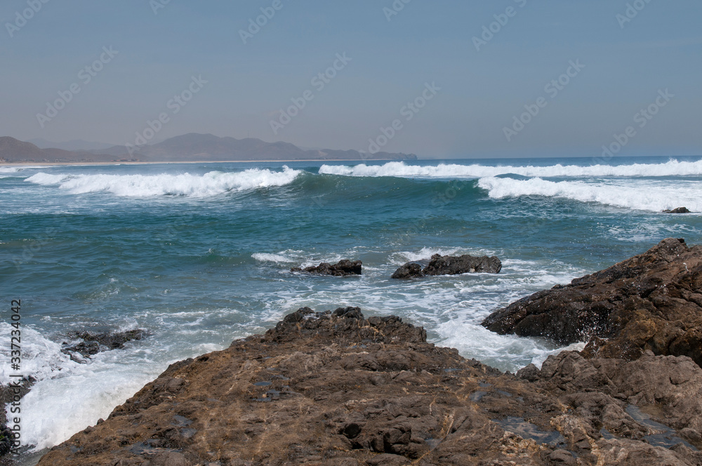 waves in the Pacific Ocean reaching Los Cerritos Beach in Todos Santos, near La Paz Baja California Sur, Mexico