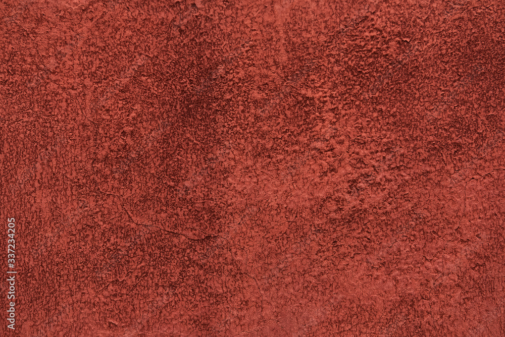 shabby terracotta stucco background with cracks