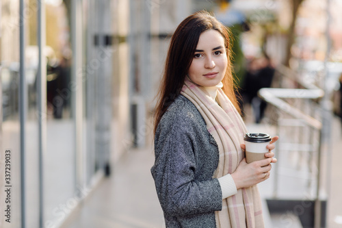 Woman portrait walking in the street