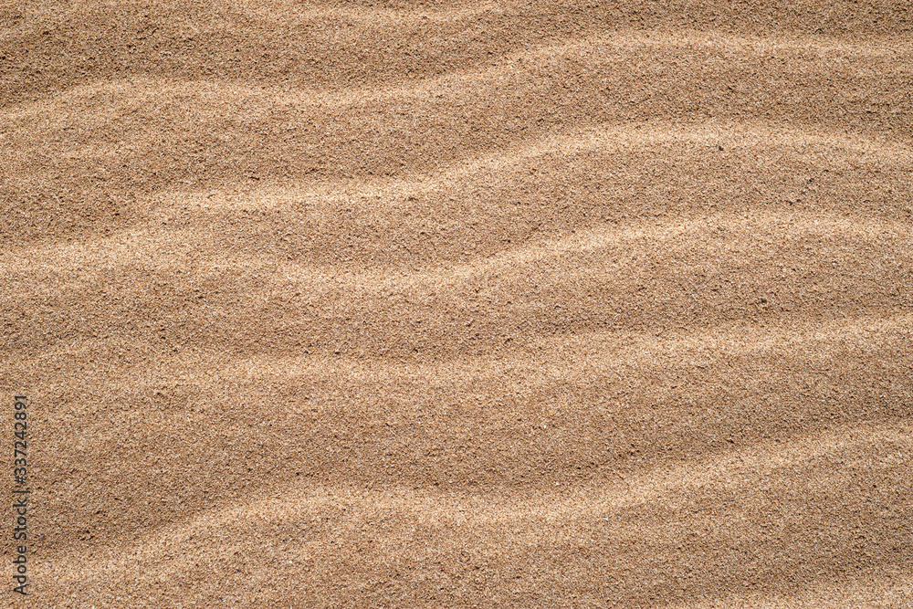 Closeup sand on the beach using as background Closeup sand on the beach using as background