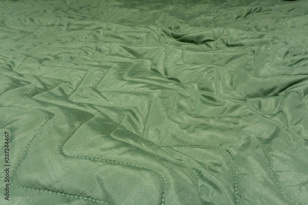 green crumpled blanket for the couch green crumpled blanket for the couch