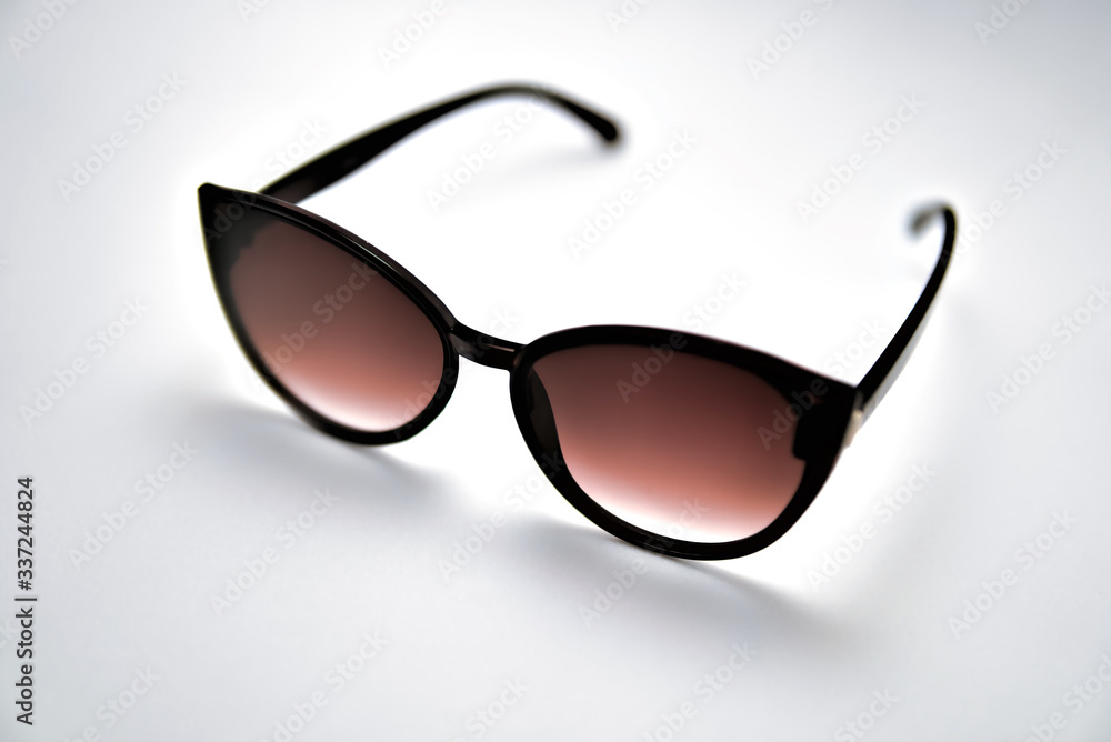 Brown sunglasses isolated on a white background Brown sunglasses isolated on a white background