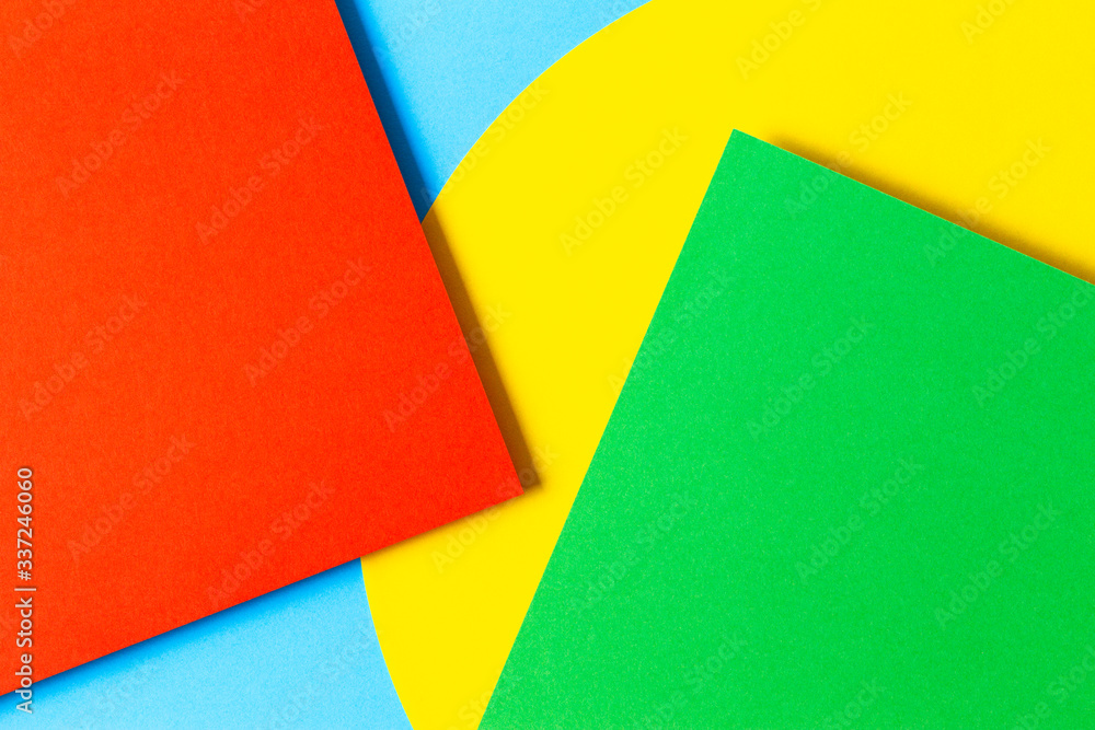 Abstract colored paper texture background. Minimal geometric shapes and lines in yellow, light blue, red, green colors