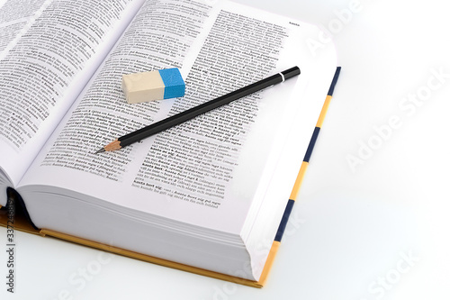 Swedish dictionary, rubber and pencil.