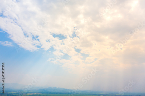 Abstract Natural bright sunlight sky background with light effect  Lens flare realistic illustration. Solar flash with golden rays during sunrise or sunset for backdrop design.
