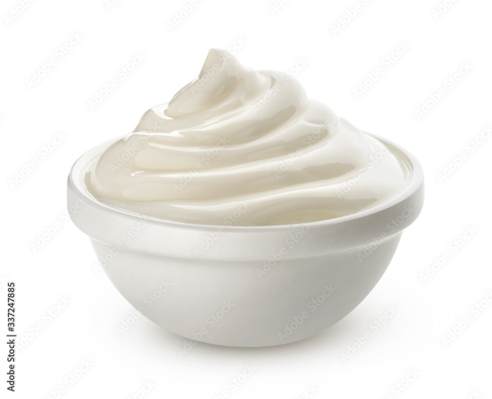 Sour cream in bowl isolated on white background Sour cream in bowl isolated on white background