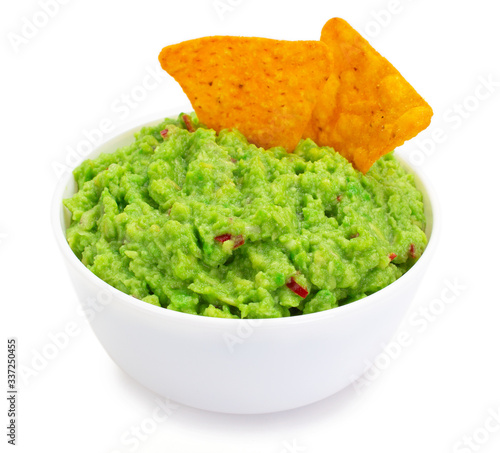 Bowl of guacamole with nachos