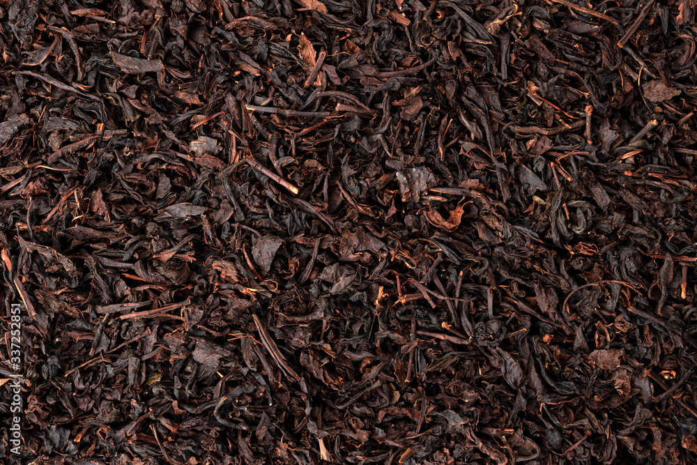 Dry tea leaves background or texture, black tea pattern Dry tea leaves background or texture, black tea pattern