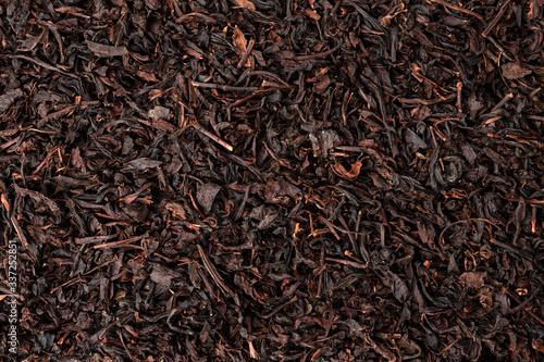 Dry tea leaves background or texture, black tea pattern