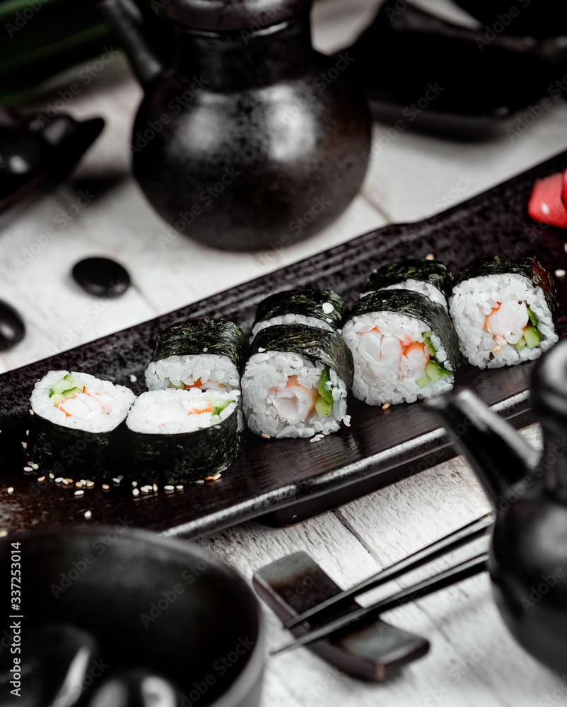 black sushi with rice on the table black sushi with rice on the table