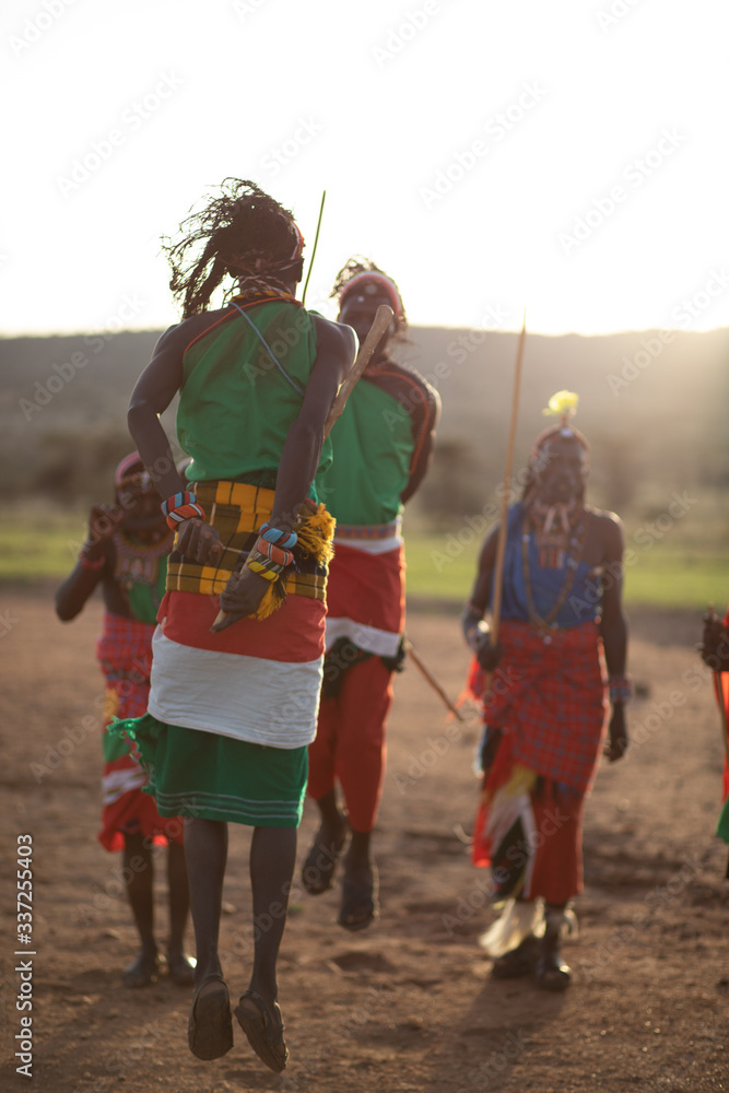 Fototapeta premium group of Maasai warriors jumping