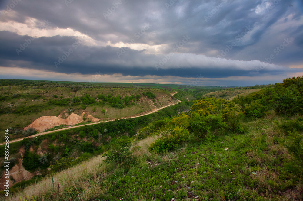 river in green landscape and dramatic clouds with blue sky river in green landscape and dramatic clouds with blue sky