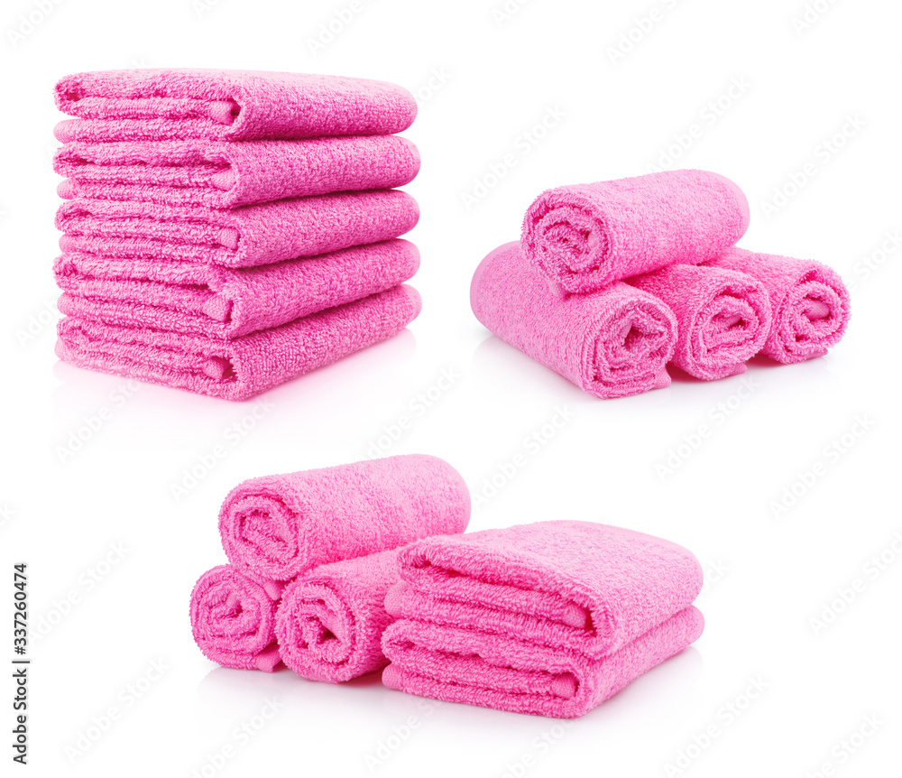 Set of pink towels, isolated on white background Set of pink towels, isolated on white background