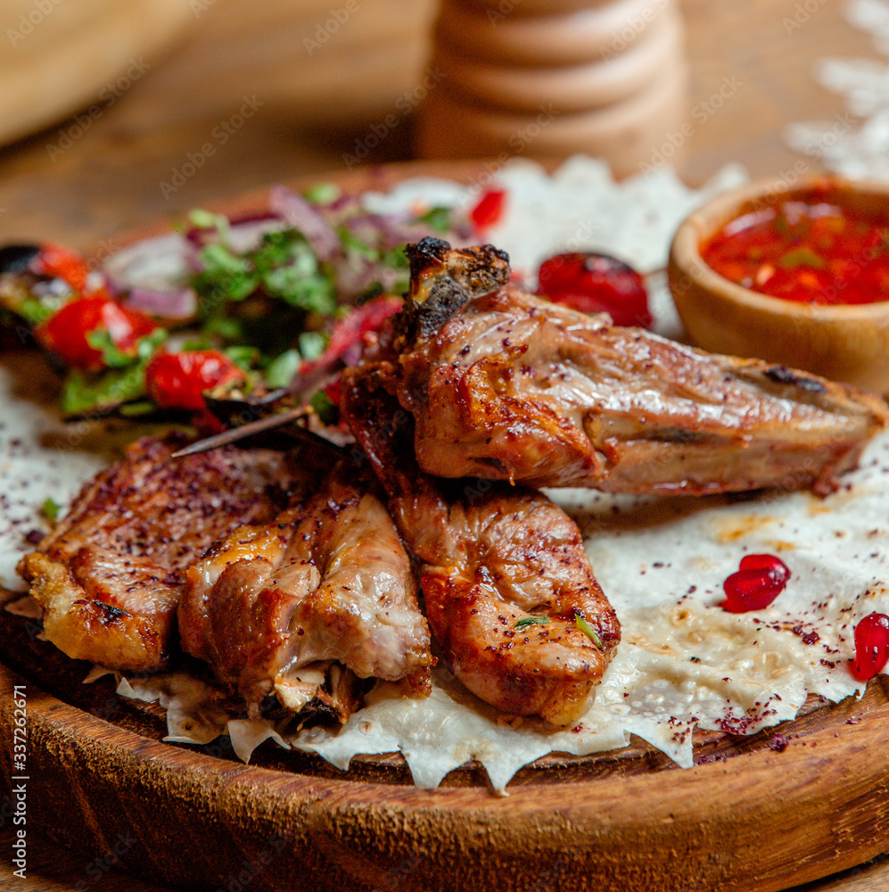 chicken kebab on the table in lavash