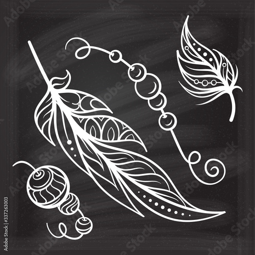 Vector hand-drawn boho style elements set on a chalkboard background