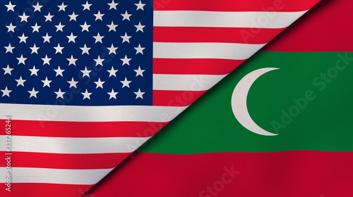 The flags of United States and Maldives. News, reportage, business background. 3d illustration