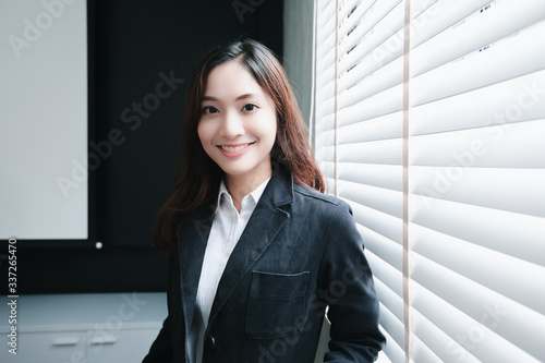 Asian business women smiling happy for working