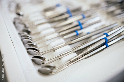 close up of dentist tools with copy space