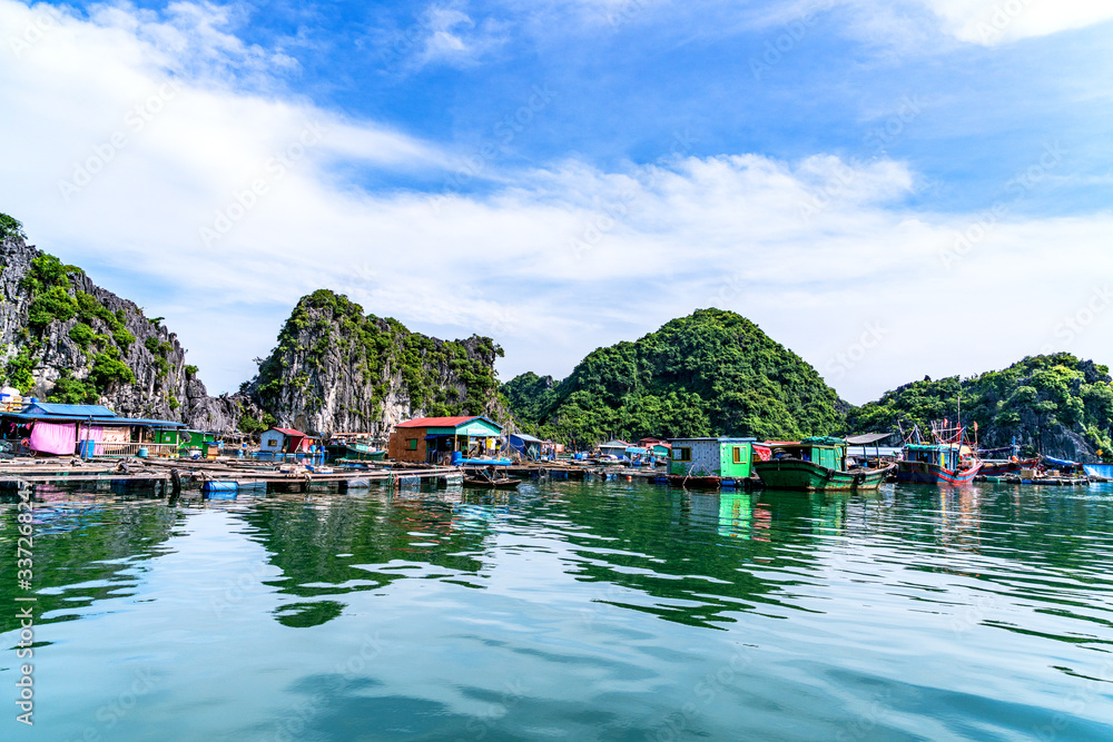 Floating fishing village and rock island in Floating fishing village and rock island in