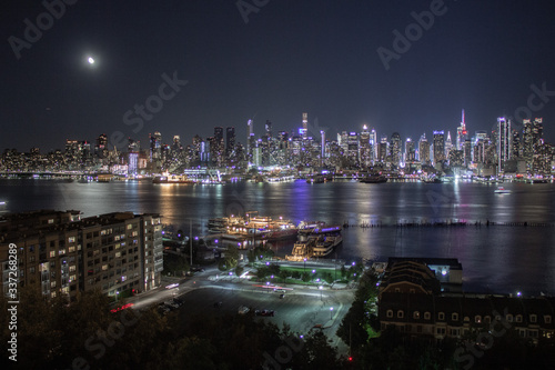 New York City with buildings, streets, during clear night