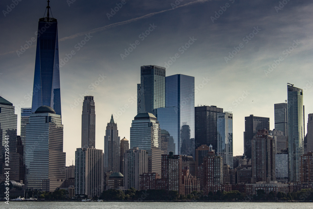 New York City with buildings, streets, during clear day