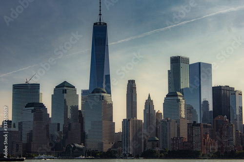 New York City with buildings  streets  during clear day