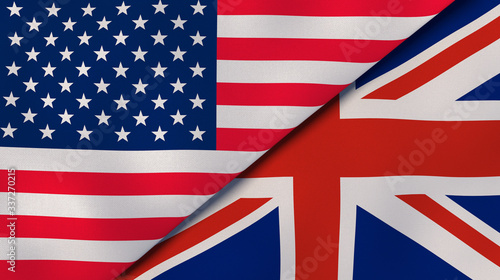 The flags of United States and United Kingdom. News, reportage, business background. 3d illustration