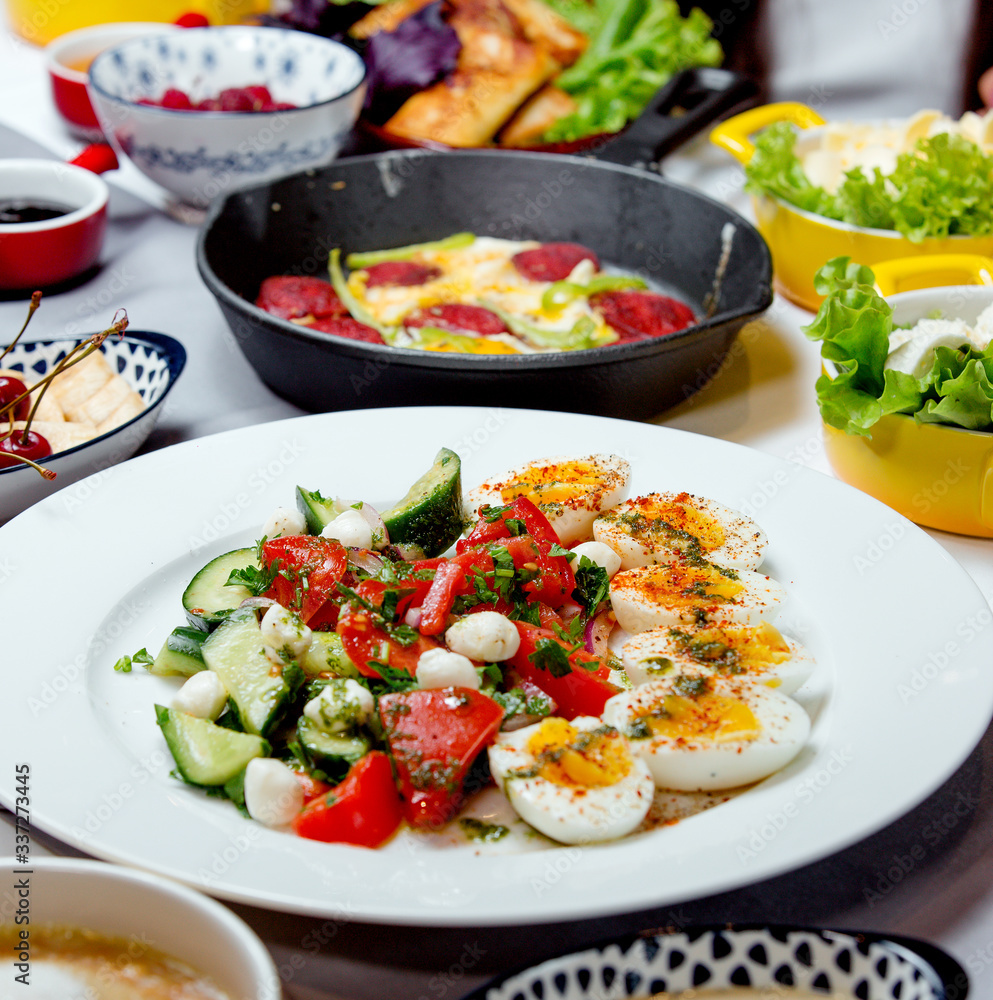 egg salad with vegetables on the table egg salad with vegetables on the table