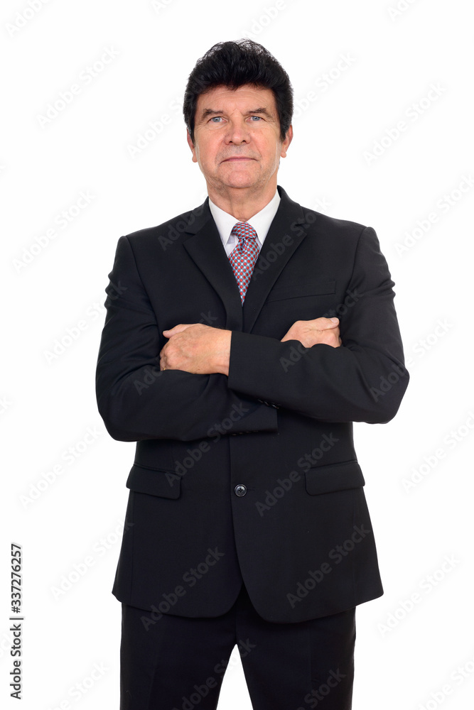 Portrait of mature handsome businessman in suit with arms crossed Portrait of mature handsome businessman in suit with arms crossed