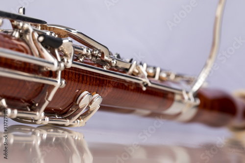 Wooden bassoon isolated on a white background. Music instruments.