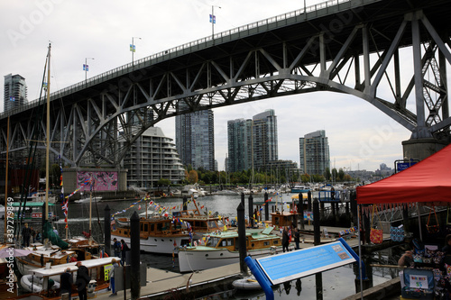 Vancouver, America - August 18, 2019: False Creek Bay alongside the Granville street bridge, Vancouver, America photo