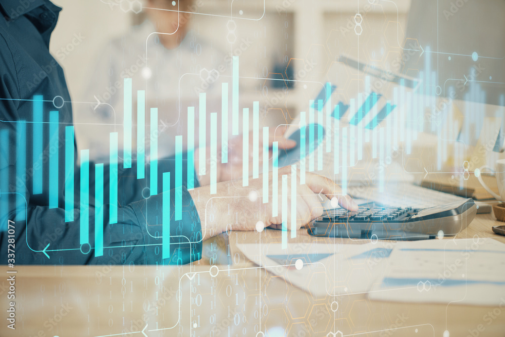 Double exposure of graph with man typing on computer in office on background. Concept of hard work. Closeup. Double exposure of graph with man typing on computer in office on background. Concept of hard work. Closeup.
