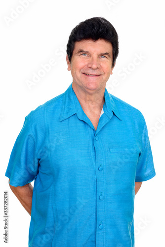 Portrait of happy mature handsome man smiling