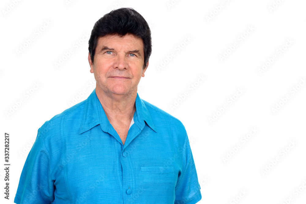 Portrait of mature handsome man looking at camera Portrait of mature handsome man looking at camera