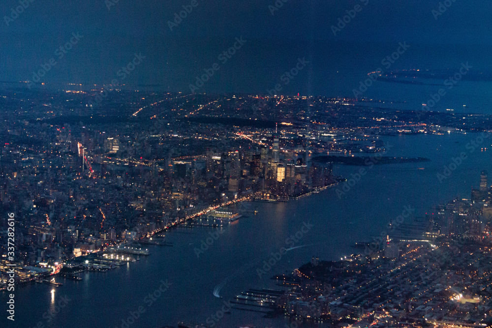 Nigh view of New York City from the air, plane