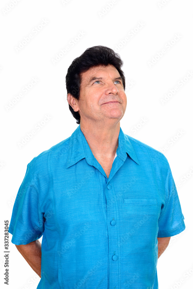 Portrait of mature handsome man thinking and looking up Portrait of mature handsome man thinking and looking up