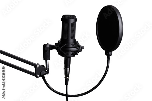Professional condenser studio microphone on white background.
