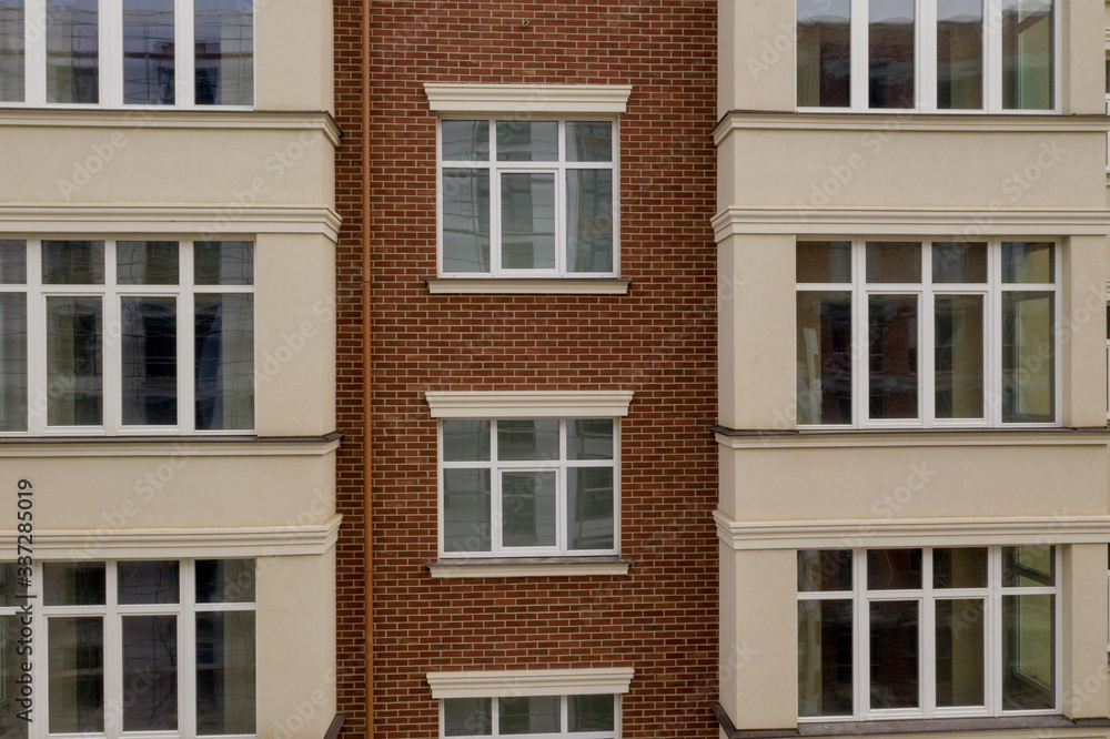 Obraz premium The property. New modern building with balconies, close-up, fragment. Close-up of glass balconies of modern hotel building