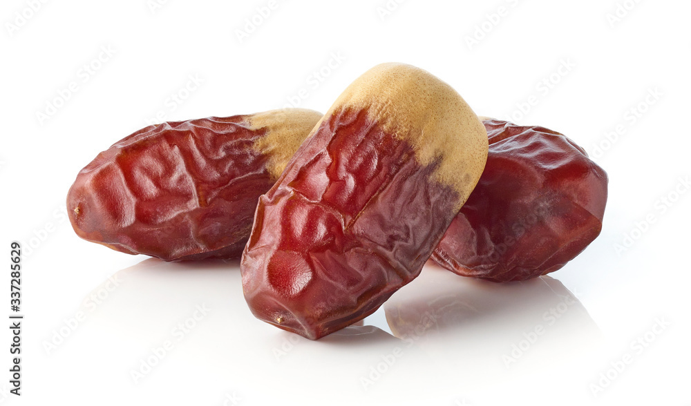Heap of dates isolated on white background