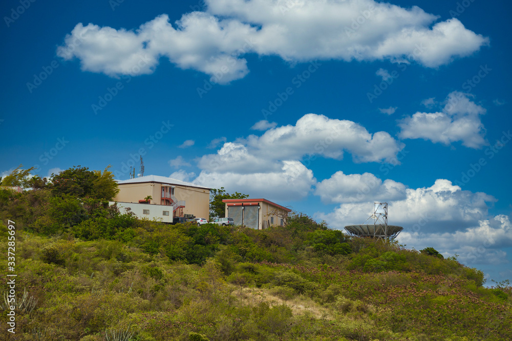 Industrial area on a tropical hill with metal buildings