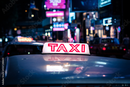 Canvas Print Taxi sign  cab  car  in Hong Kong at night