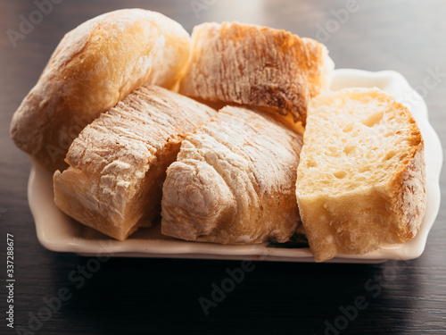 Sliced homemade bread in flour.