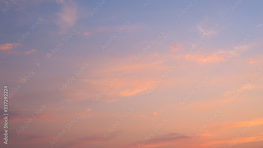 pink pastel clouds at sunset blue sky. abstract photo, background image.