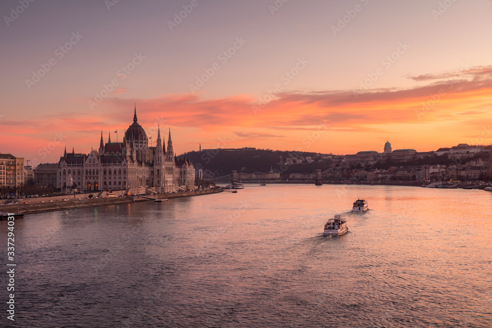 Typical panorama view of Budapest with Parliament and Buda castle on Danube river, Hungary