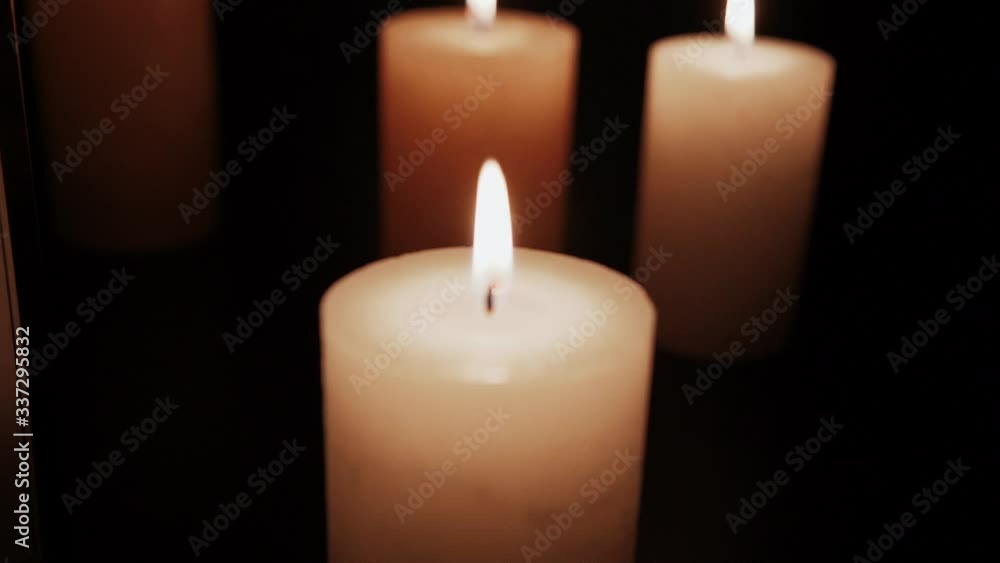 Candle burns slowly macro. slow motion