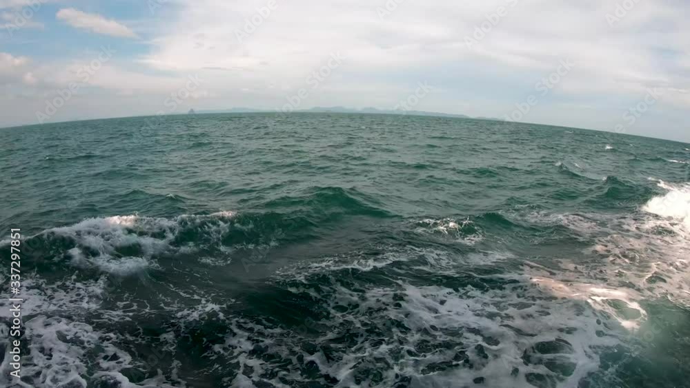 POV boat: Green ocean waters of the Thailand islands in Andaman sea POV boat: Green ocean waters of the Thailand islands in Andaman sea