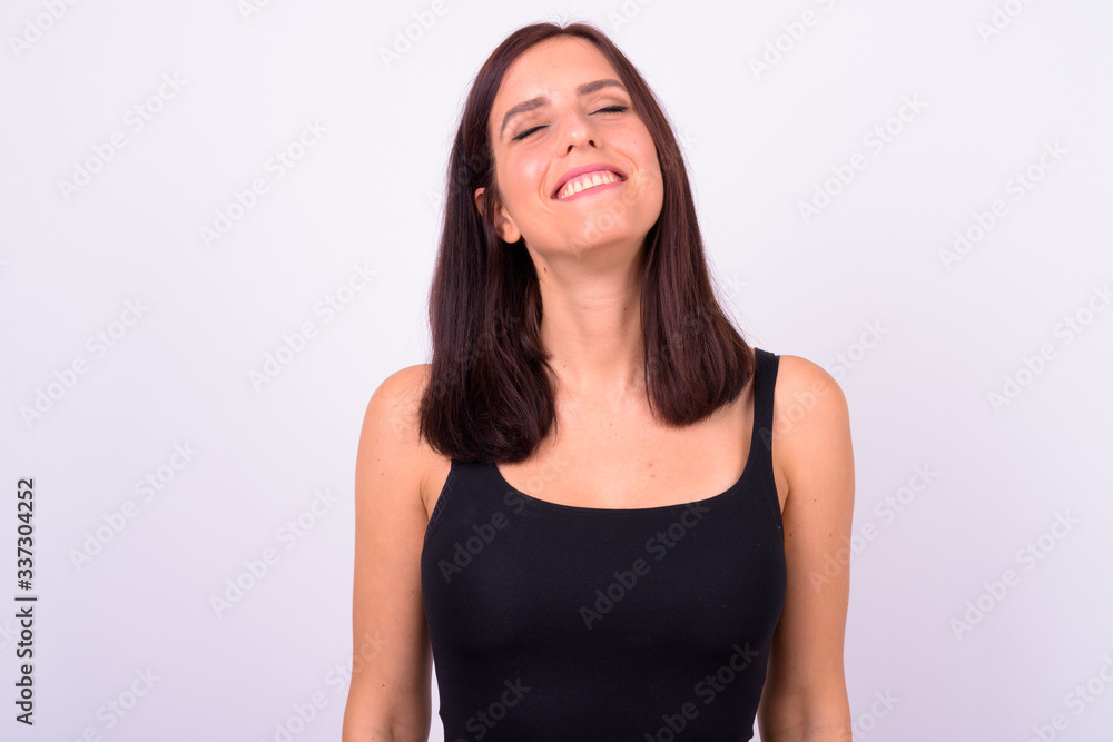 Portrait of happy young beautiful woman with eyes closed Portrait of happy young beautiful woman with eyes closed