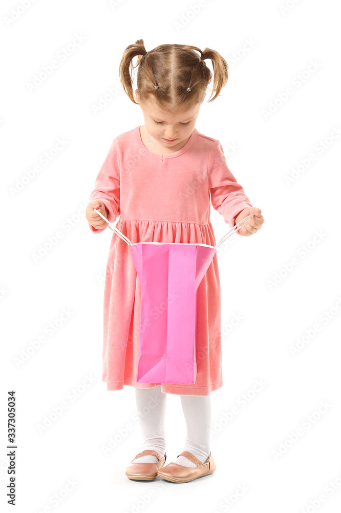 Cute little girl with shopping bag on white background Cute little girl with shopping bag on white background
