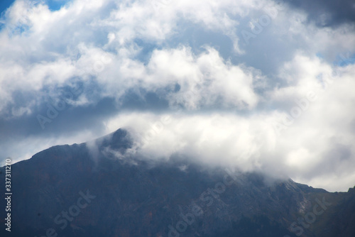 Mountain landscape with cloudy sky
