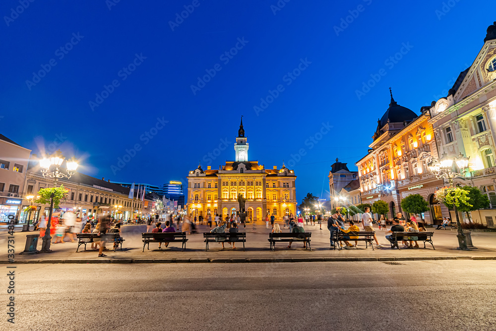 Novi Sad, Serbia - July 19, 2019: Freedom Square (serbian: Trg slobode) is the main square in Novi Sad. The photo shows County government office (City house) and monument of Svetozar Miletic.